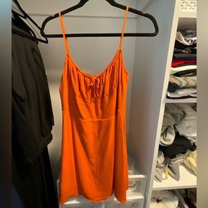 Sunday Best ARITZIA
DELILAH MINI DRESS
In ORANGE